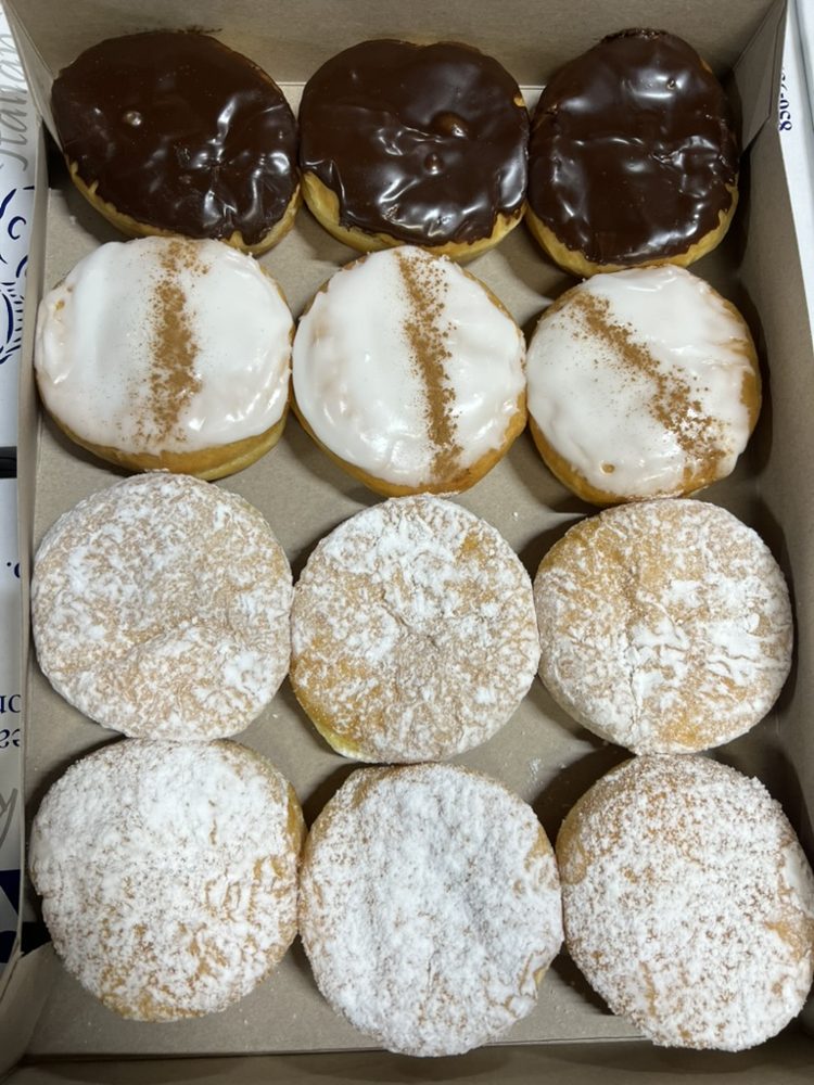 Boston cream, cinnamon iced and powdered donuts